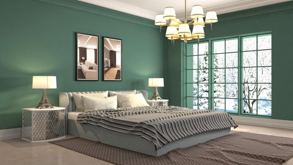 Łóżko na tle zielonej ściany
