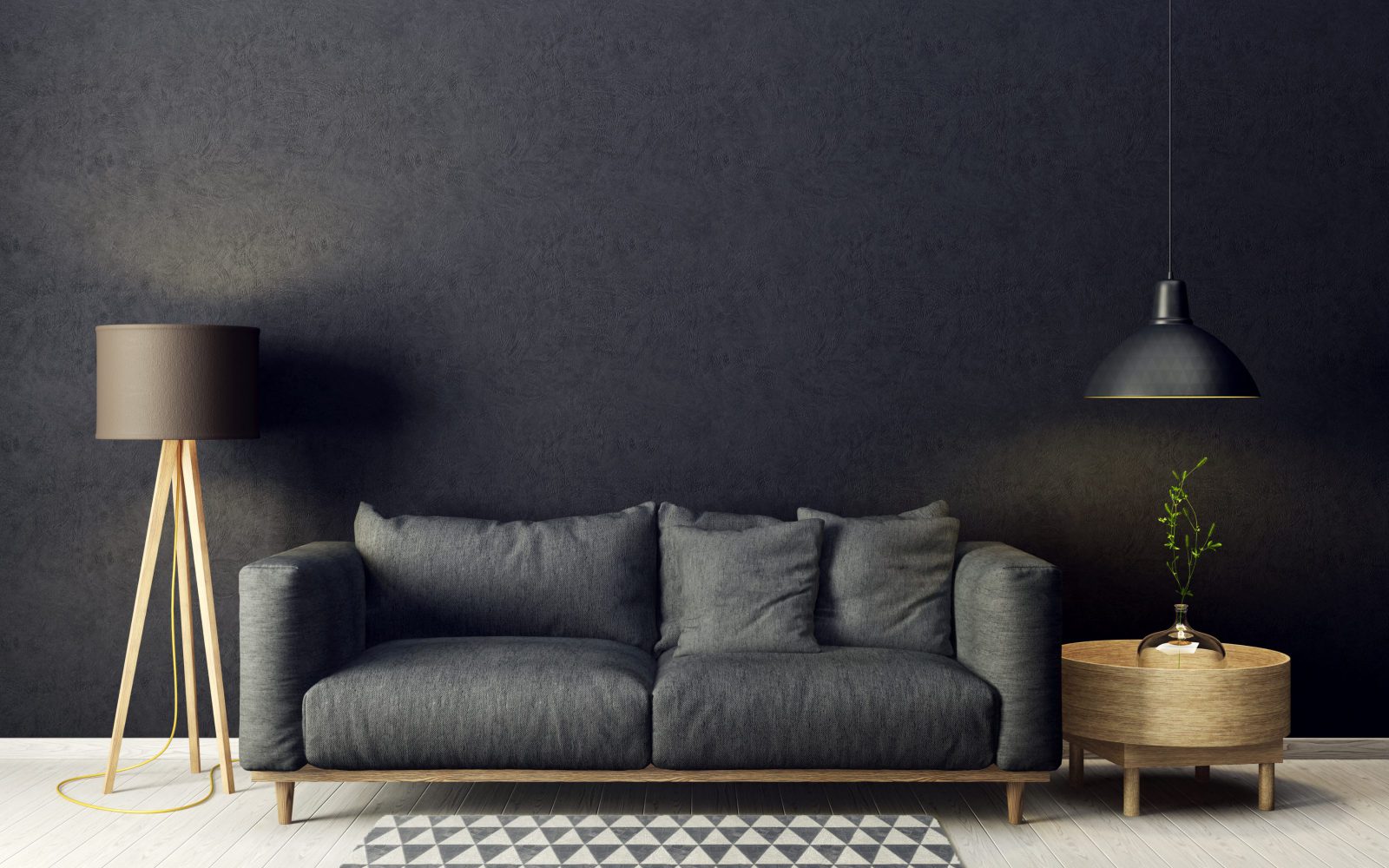 ciemnoszara sofa, ciemna ściana